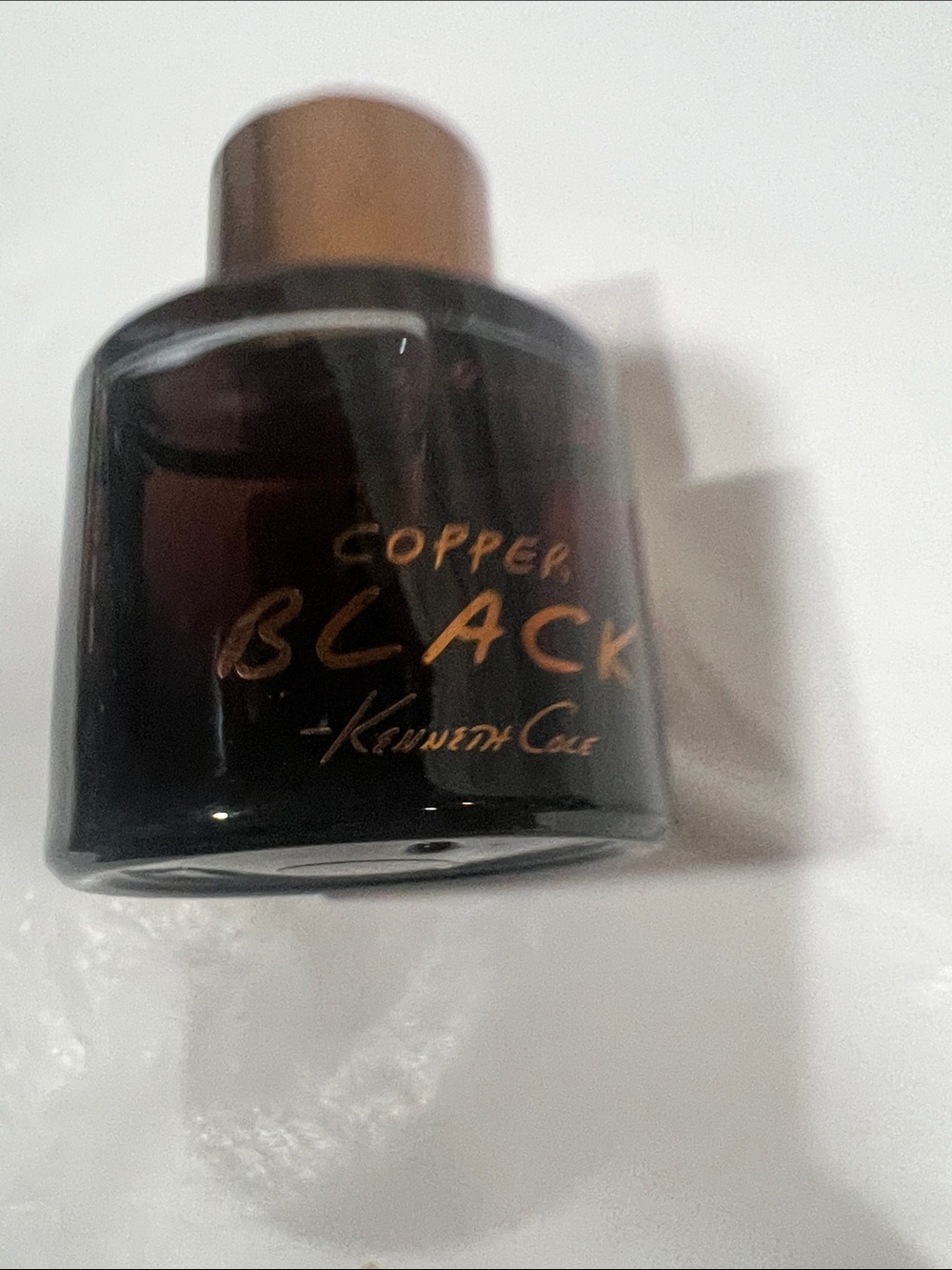 Kenneth Cole copper black perf.